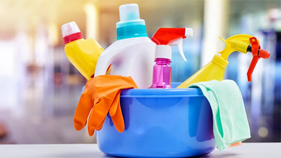 A basket of cleaning supplies