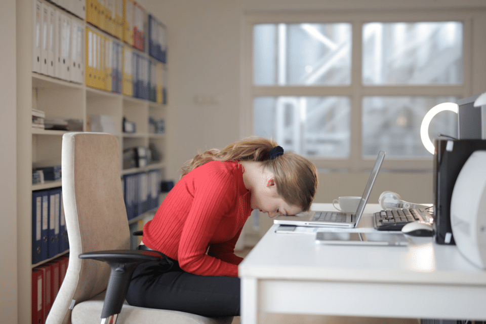 Girl in Office Is Weary